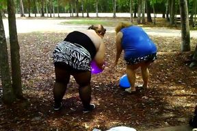 2 bbws are balloon blowing and popping
