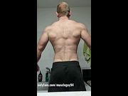 muscular bodybuilder doing muscle worship