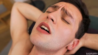 Alex moans deeply as Alex swallows his entire cock