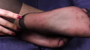 ”Sexy redhead in black pantyhose shows perfect ass & feet”