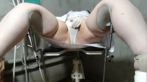 Nurse masturbates on a gynecological chair