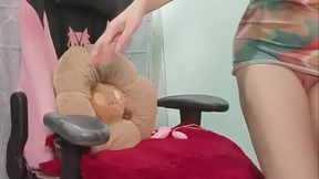 The nurse's vagina was spread open, and a dildo was used to stimulate her clitoris until she reached orgasm.