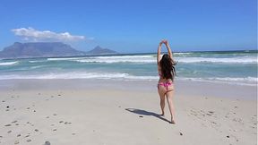 Stripping and frolicking on a public beach