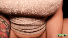 Chubby Asian MILF with big tits gives a sexy blowjob in cowgirl position