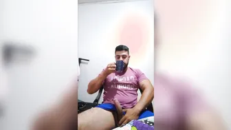 Hairy Brazilian daddy strokes his big cock and shoots a thick load