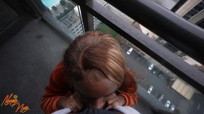 Ebony sucks BBC on balcony