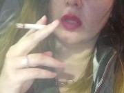 Sexy Red lips Smoking In Car In Leather Jacket