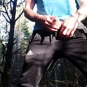 Scallyoscar in the forest pissing in a condom