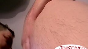 A bald black dude with a massive cock rubbing it til he cums