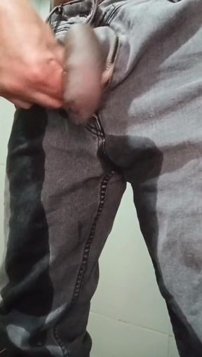 Urinating in Dark Jeans