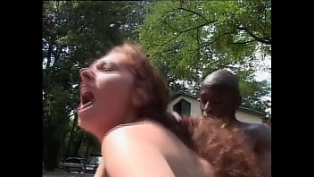 Dirty redhead gets her pussy fucked by a black worker