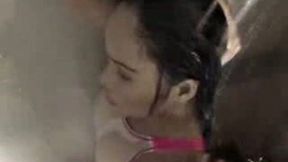 Zealous Asian girlfriend takes shower wearing swimming suit