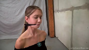 It looks like sweet blonde babe is enjoying while getting tied up in the basement