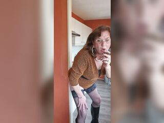 Enjoying my sex toy whilst smokin' a cigar