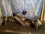 Chained masked wetsuited Orca struggles to jerk off