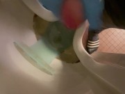 Wanking in urinal with blue nitrile gloves