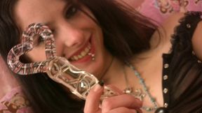 sexy teen in corset plays with a dildo and she gives a blowjob in pov