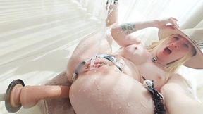 Blonde MILF in a cowgirl outfit squirts like a fountain from a dildo machine!