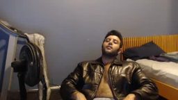 Zobi Stone Talks in a Leather Jacket