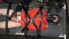 Bondage Twink Strapped to Campbed in Straitjacket and Gas Mask