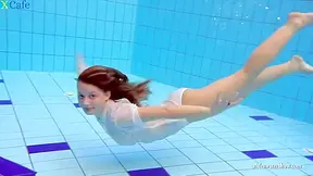 Pink Pussy Babe Undressing Underwater
