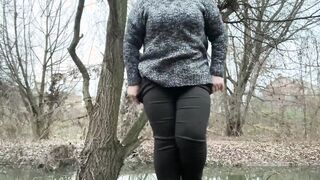 Doggy Style pee of a woman who wears tights under her leggings