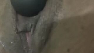 African Teases Her Gigantic Clitoris With a Sex Toy