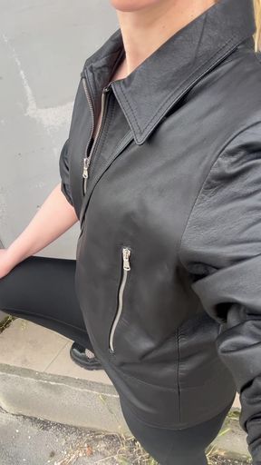 Leather jacket, sunglasses, city street