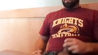 Watch this hung stud jerk off in a coffee shop, giving a bear a hot and heavy hand