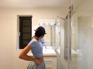 Braless large breasts Oriental cosplayer in her hot flirty short mini petticoat flashes her pants in advance of taking 'em off