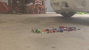 Chrissy running over small cars with her huge truck