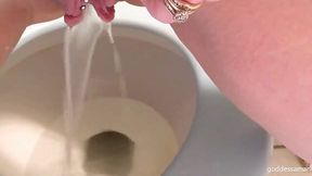 Busty Babe Pissing and Farting on the Shitter