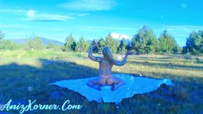 Naked musician sings and dances in the mountains