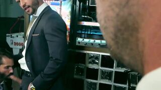 Handsome men in classy suits spitroasting pretty bottom