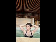 Busty brunette Jade Blair in pool in tiny bikini