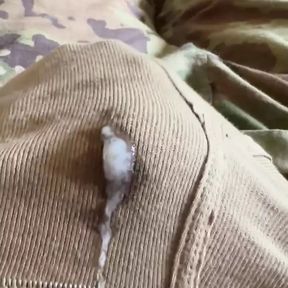 Horny soldier shoots creamy load through his military briefs and on his unit patch