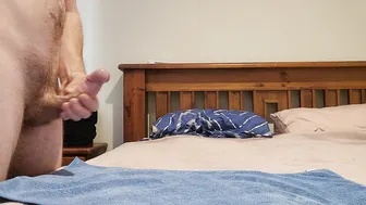 Hung Australian hunk jerks his thick cock and shoots a massive load