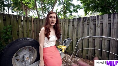 Redheaded seductress Kiki Vidis rides her stepson in the living room until he cums on her face