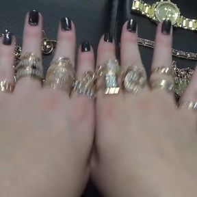 Golden jewelry and hand fetish