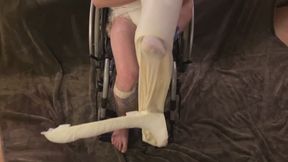 Putting on LLC on wheelchair