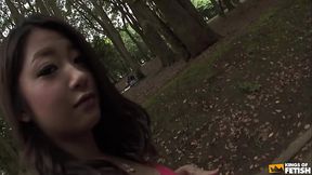 Japanese teen gets her bush spoiled by a handsome guy outdoor in the park