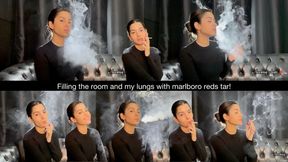 Filling the room and my lungs with marlboro reds tar!