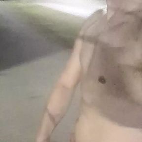 Sexy hunky jock walks around a plaza naked outside in public