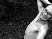 Slender man running around the forest completely naked black and white video