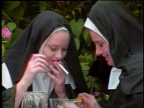 Randy nuns having a meal outdoors