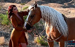 Redhead MILF babe Odette loving the outdoors and gets naked in it