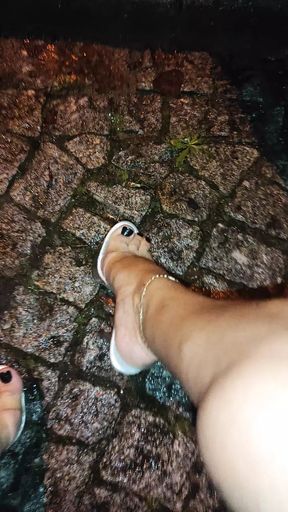 JoanaLoveTs masturbating outdoors in a rainy night