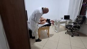 a milf gets fingered by the proctologist during an anal exam.