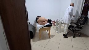 a milf gets fingered by the proctologist during an anal exam.