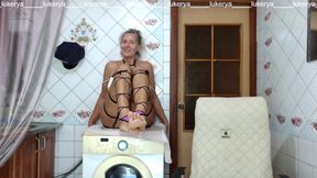 Lukerya Tries on a Pink Handmade Dress on Her Body